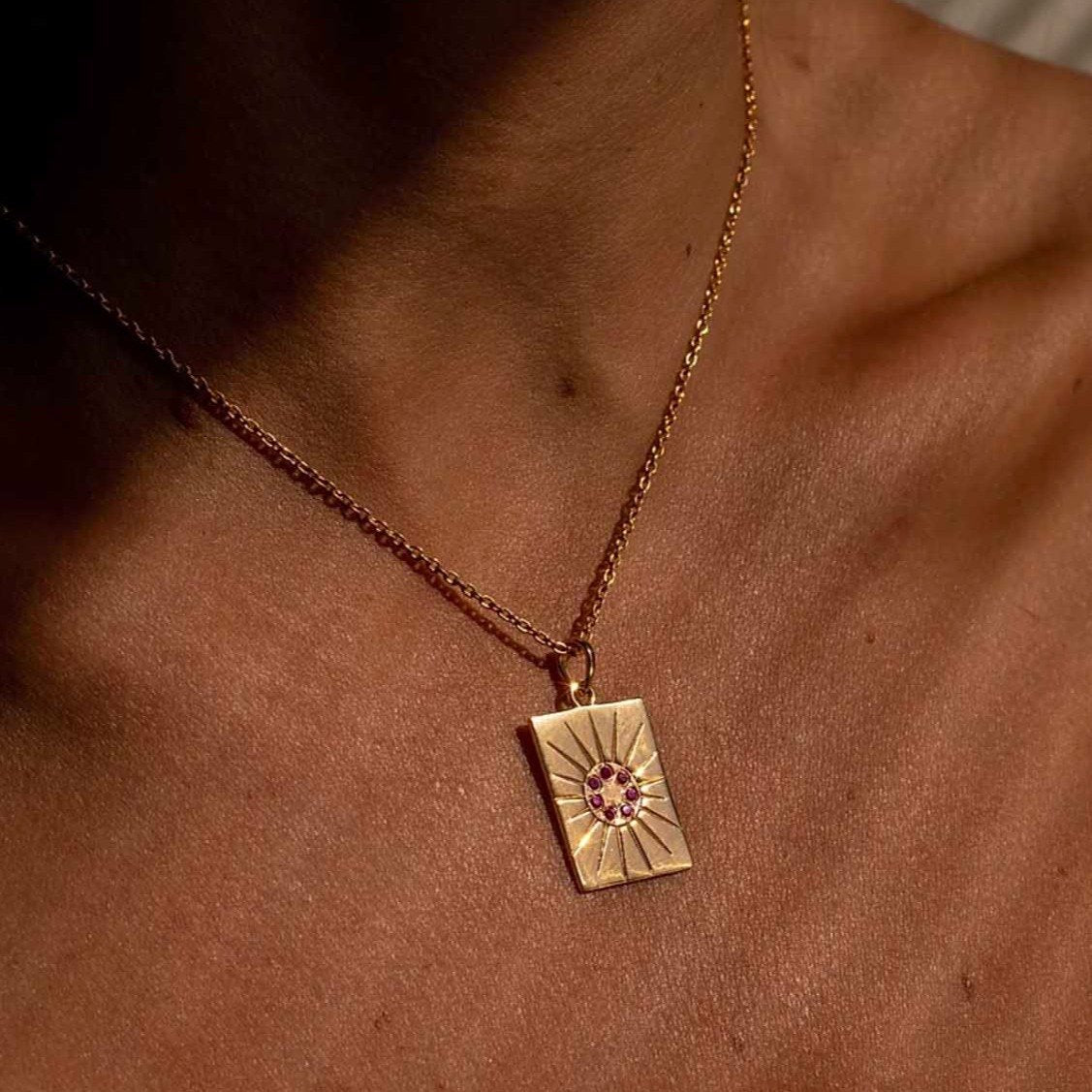 The Ananda pendant is 15.3mm x 20.3mm. Chain length: 50cm Features adjustable hoops to shorten chain. Beautifully handcrafted in 2 micron 18k Gold on solid 925 Sterling Silver.