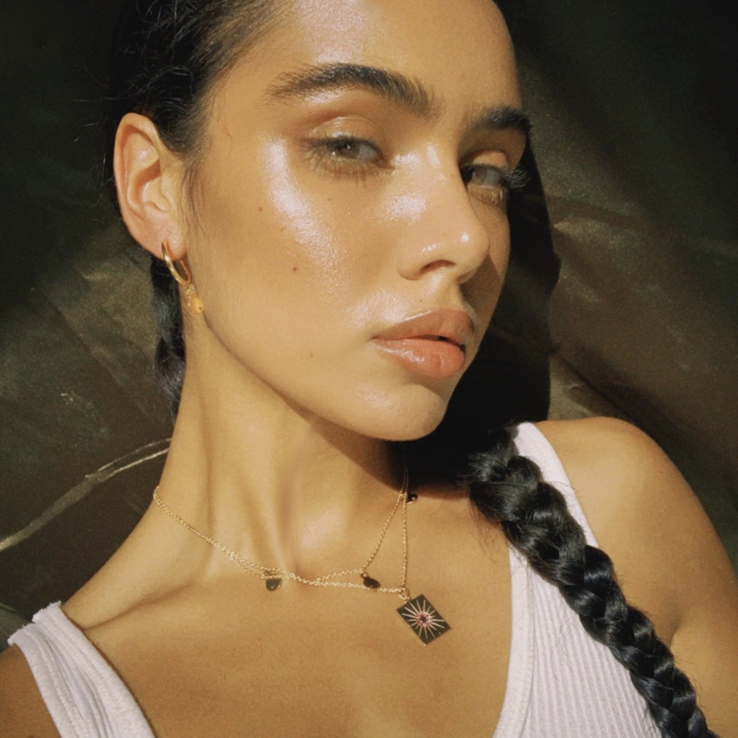 The Ananda pendant is 15.3mm x 20.3mm. Chain length: 50cm Features adjustable hoops to shorten chain. Beautifully handcrafted in 2 micron 18k Gold on solid 925 Sterling Silver.